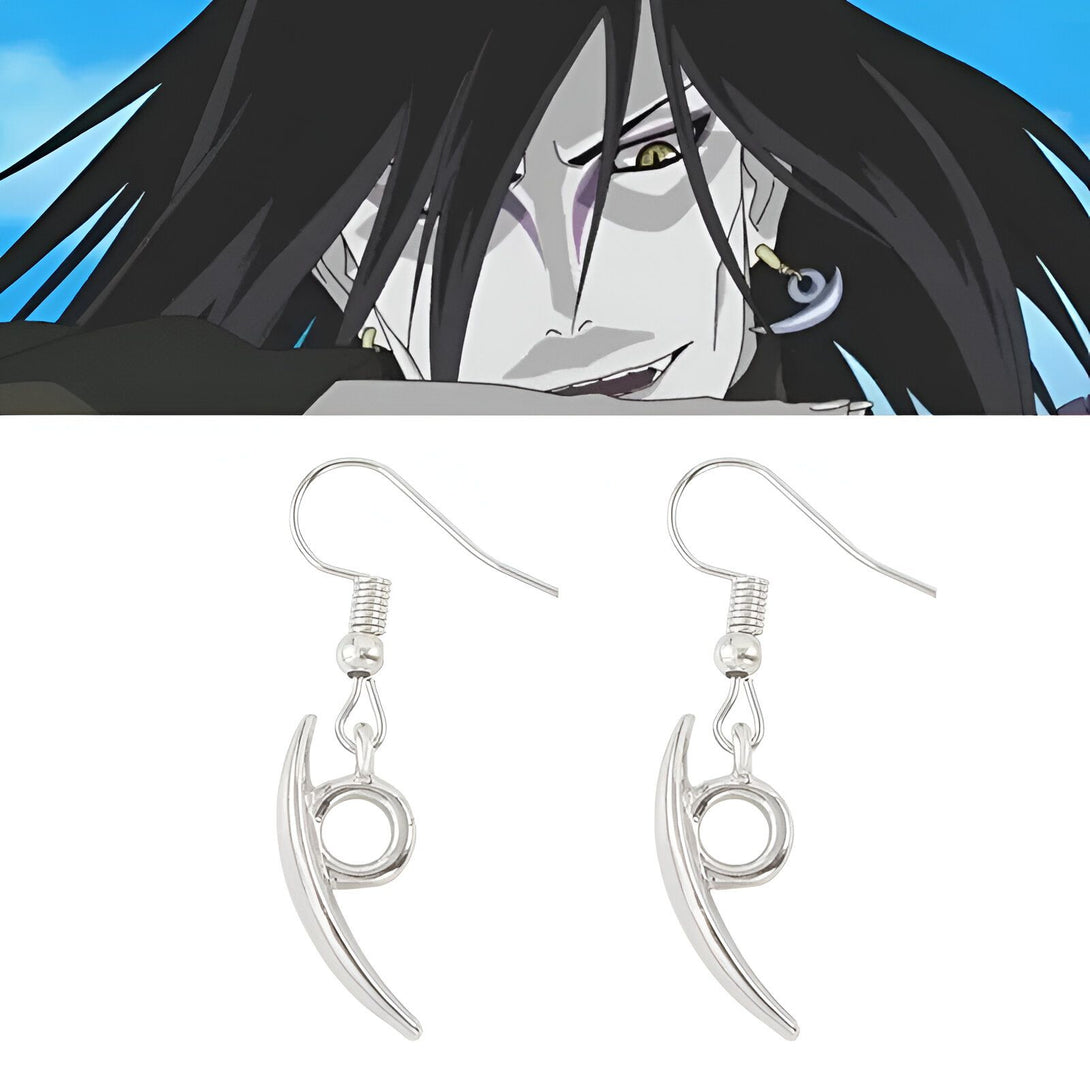Une paire de boucles d'oreilles en argent représentant le symbole du Sharingan de Sasuke Uchiwa, un personnage de l'anime Naruto. Ces boucles d'oreilles sont un accessoire parfait pour les fans de la série.
