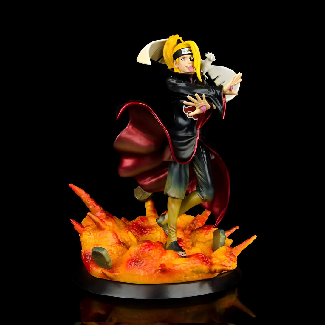 Statue de Pain, un personnage de l'anime Naruto, debout sur une base de flammes. Il porte son costume rouge et noir emblématique et a les yeux rouges. Il tient une créature blanche dans sa main gauche.