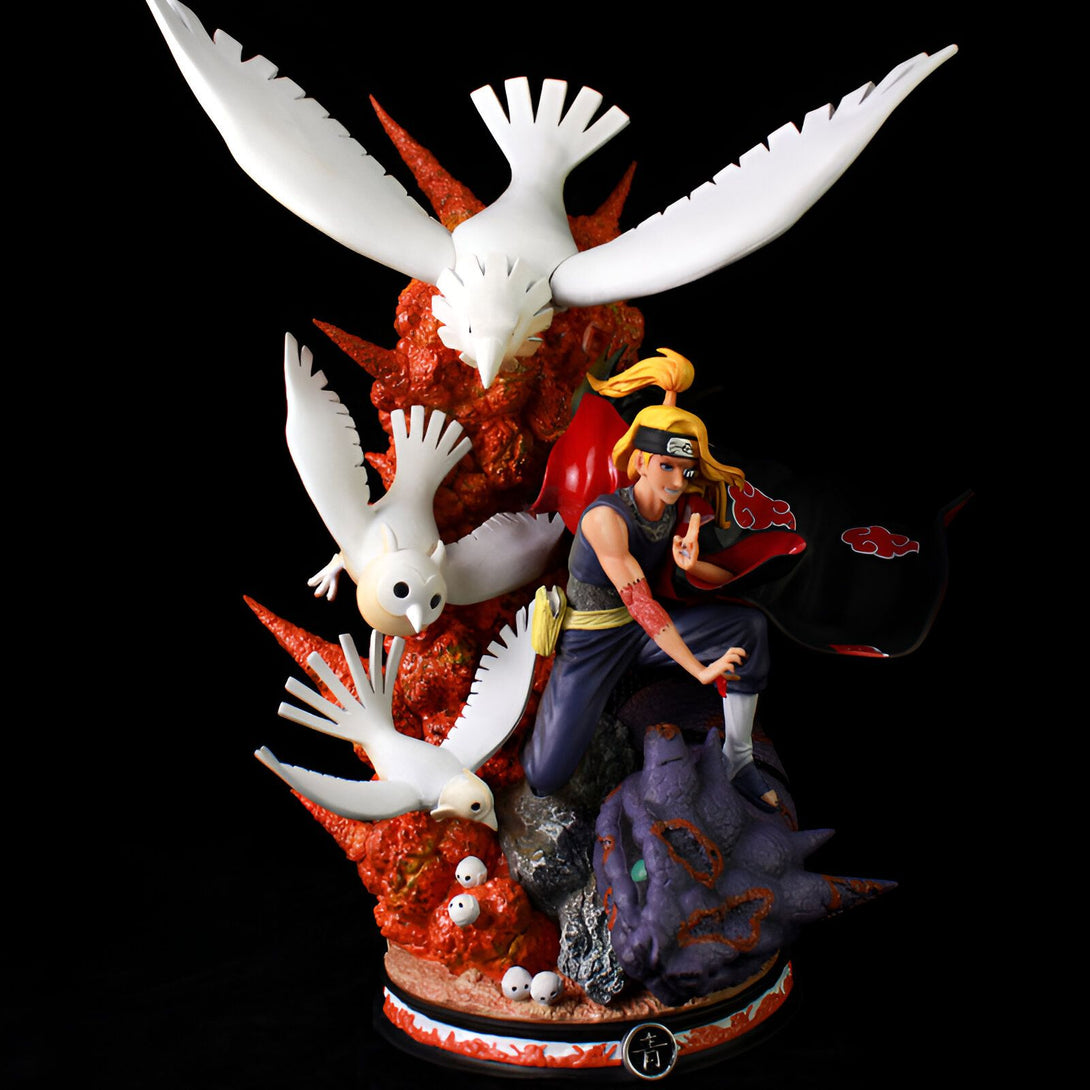 Statue de Pain, un personnage de l'anime Naruto, entouré de trois oiseaux blancs et d'un environnement rouge et or. La statue est posée sur une base noire avec un kanji en rouge. La statue est un produit officiel Naruto.