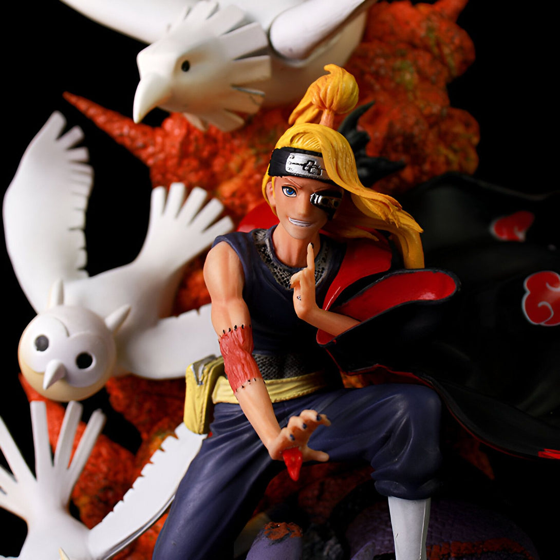 Statue de Pain, personnage de l'anime Naruto, en position d'attaque, entouré d'oiseaux blancs et d'un fond rouge et orange. Cette figurine est parfaite pour les fans de Naruto.