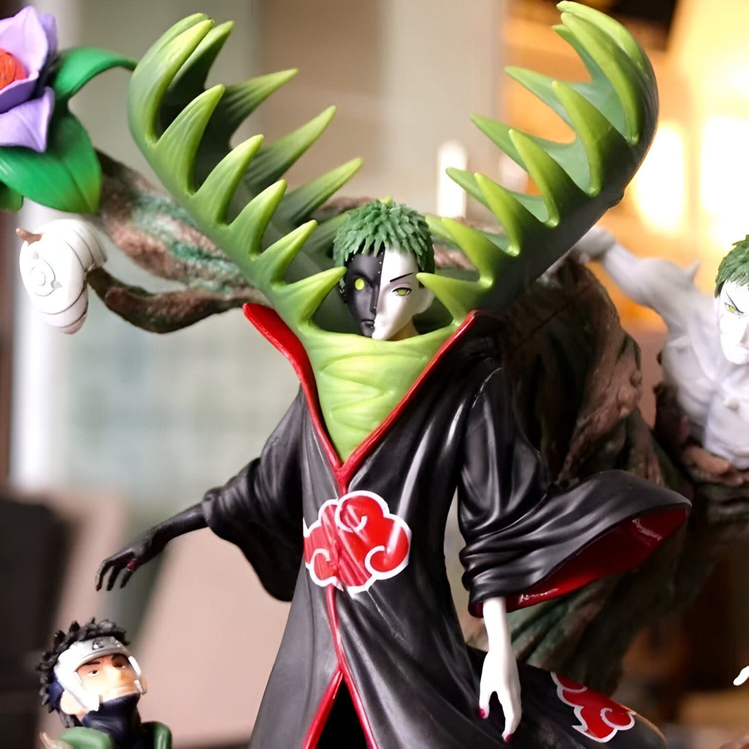 Figurine de Naruto représentant Zetsu, un personnage fictif de l'univers de Naruto. Zetsu est un personnage avec un corps vert et blanc et un visage blanc avec des yeux noirs. Il est vêtu d'un manteau noir avec un symbole rouge sur la poitrine. Cette figurine est un excellent ajout à toute collection de Naruto.