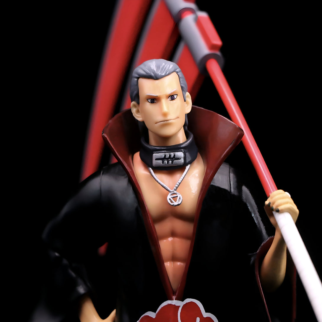 Figure de collection de Pain, un personnage emblématique de l'anime Naruto, brandissant sa puissante arme rouge.