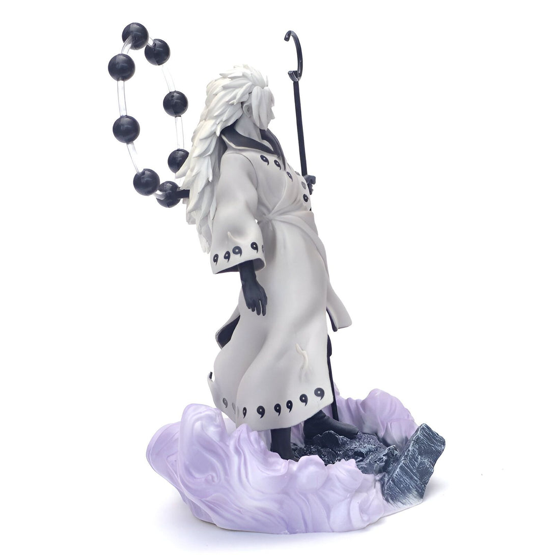 Figurines de collection de Naruto, représentant Pain/Nagato avec son Rinnegan, tenant son bâton dans sa main gauche, debout sur un nuage violet.