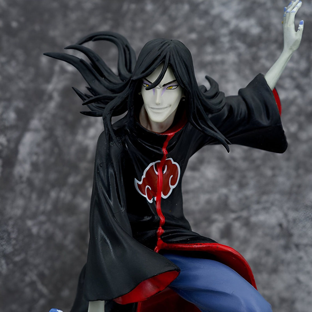 Figurine de Pain, un personnage de l'anime Naruto, portant une tenue noire avec le symbole Akatsuki rouge sur la poitrine.