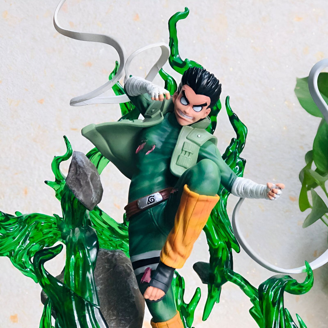 Statue de Rock Lee de Naruto en action, utilisant le "Lotus de la feuille", entouré d'effets de feuillage vert.