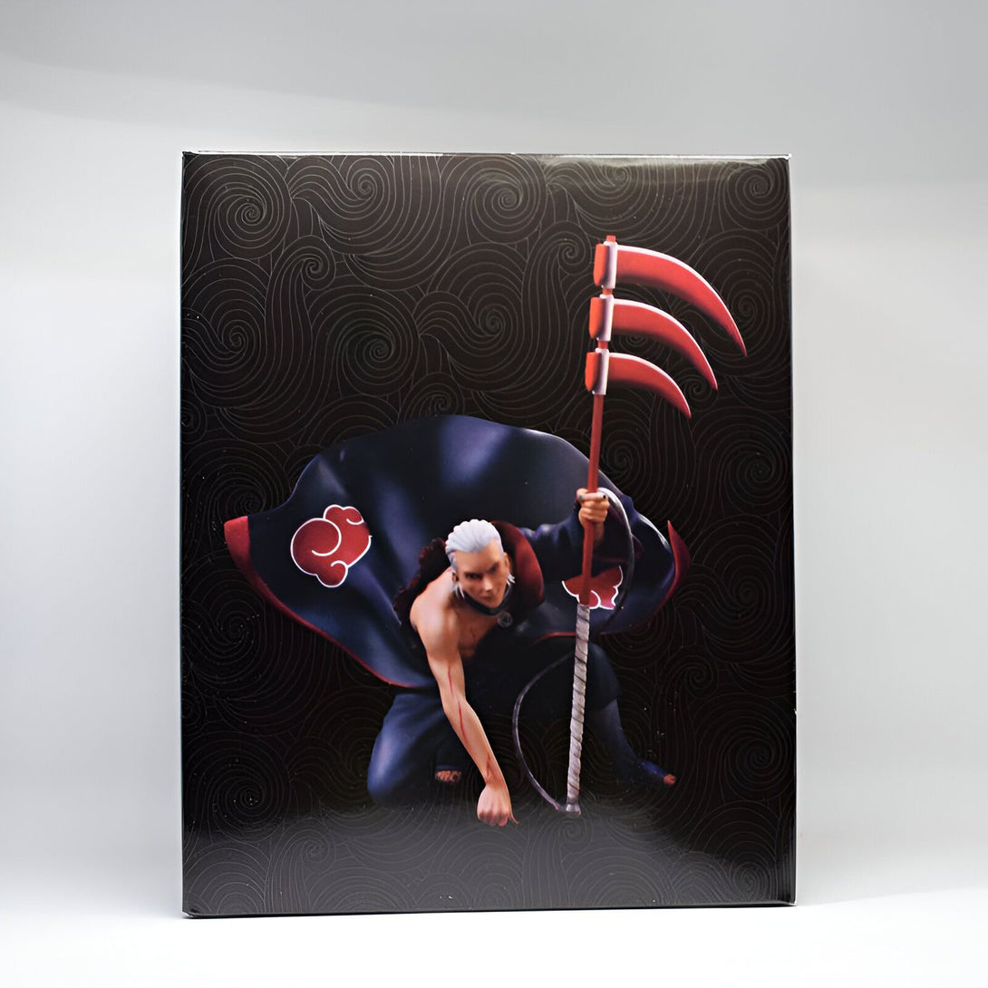 Boîte de figurine Naruto représentant Pain, un personnage de l'univers Naruto avec son arme et son emblème du village caché de la pluie.