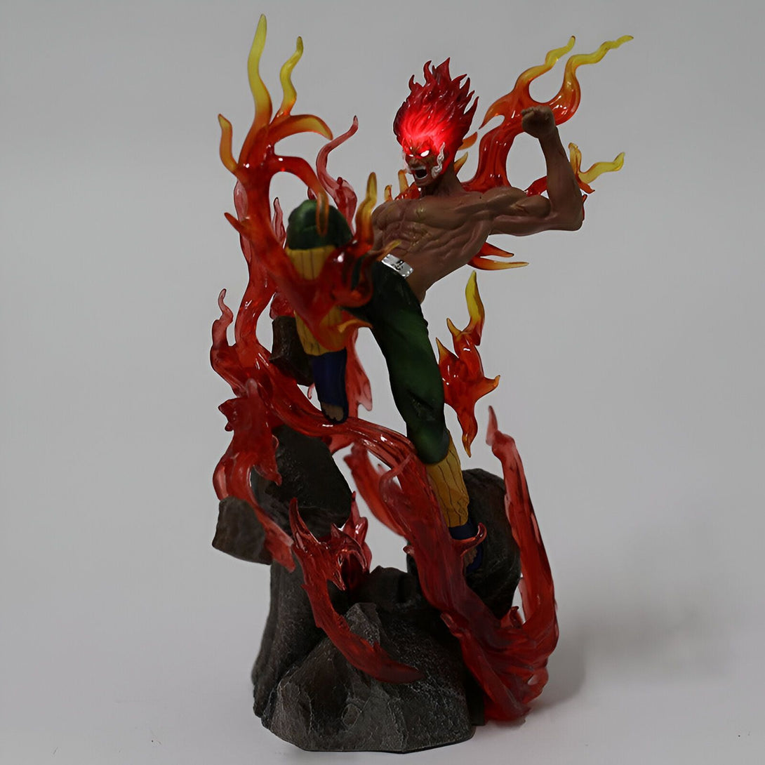 Figur de collection de Naruto représentant Might Guy en mode Huit Portes intérieures, entouré de flammes rouges et jaunes.