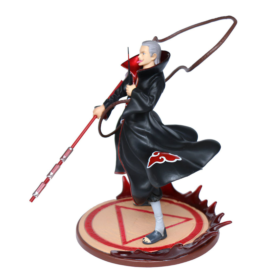 Figure de collection de Pain, le leader d'Akatsuki, de l'anime Naruto. Il tient une arme et est représenté sur une base avec le symbole d'Akatsuki.