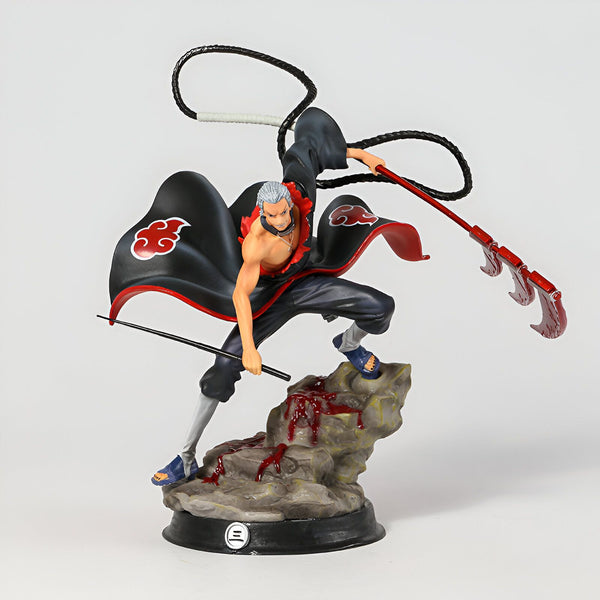 Figur de Hidan, un personnage de l'anime Naruto, tenant son arme et se tenant sur un rocher.