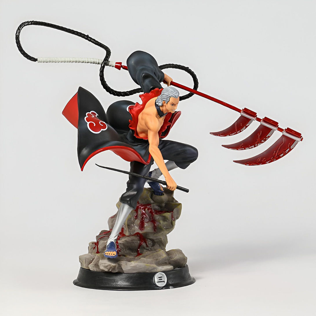 Figurine de Pain du manga Naruto, tenant une arme à lames multiples et une corde.