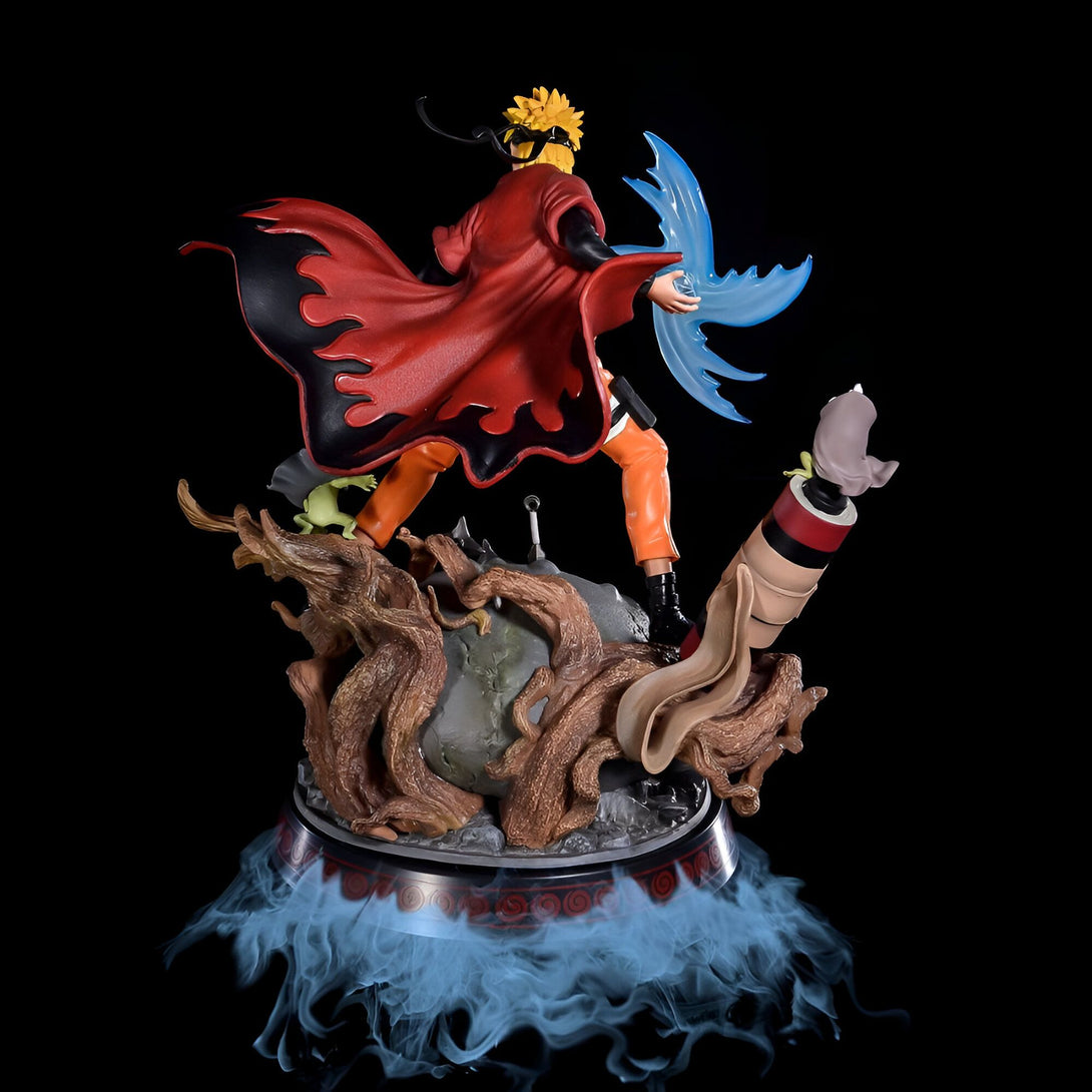 Statue de Naruto Uzumaki en mode Sage des Six Chemins, portant un manteau rouge avec des flammes noires, tenant le Rasengan avec une base en bois et une fumée bleue.