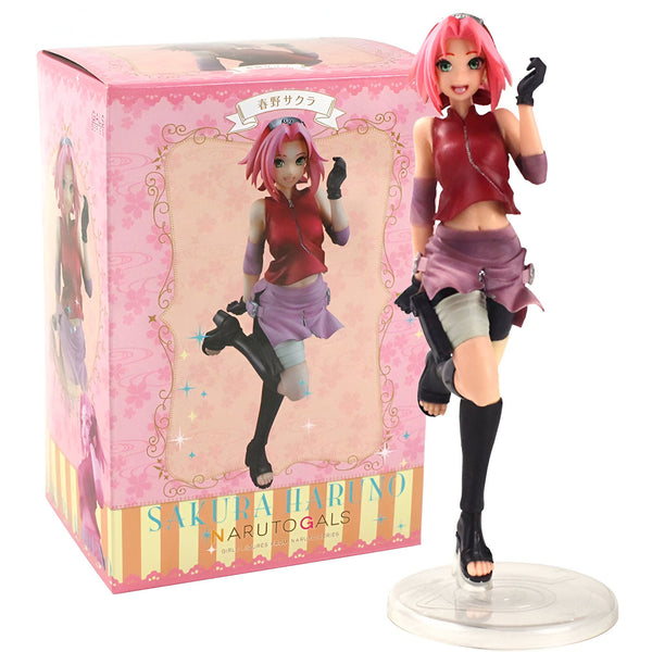 Figurines de Sakura Haruno de Naruto, dans une pose dynamique avec une boîte d'emballage. La figurine est dans une posture dynamique, elle est prête à se battre. Elle porte sa tenue de ninja.