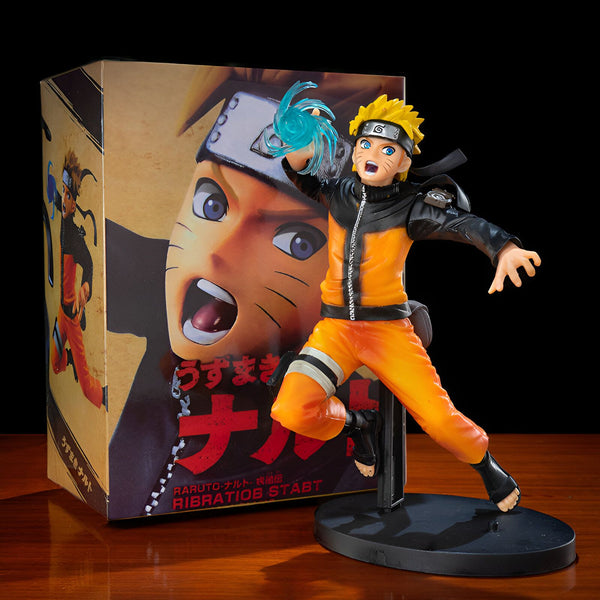 Naruto Uzumaki, le célèbre ninja de l'anime Naruto, est représenté dans une figurine dynamique. Il est en pleine action, lançant une attaque de Rasengan, son attaque signature. La figurine est accompagnée de sa boîte d'origine, ornée du logo de la série et des illustrations de Naruto.