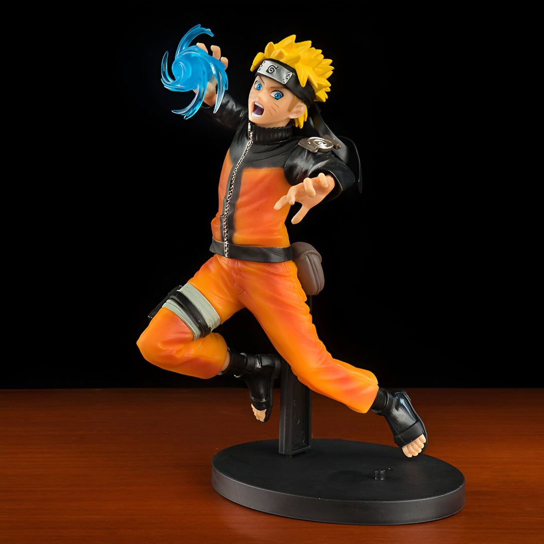 Naruto Uzumaki, le célèbre ninja de Konoha, en pleine action avec son Rasengan bleu. Figurine de collection de qualité, idéale pour les fans de l'anime Naruto.