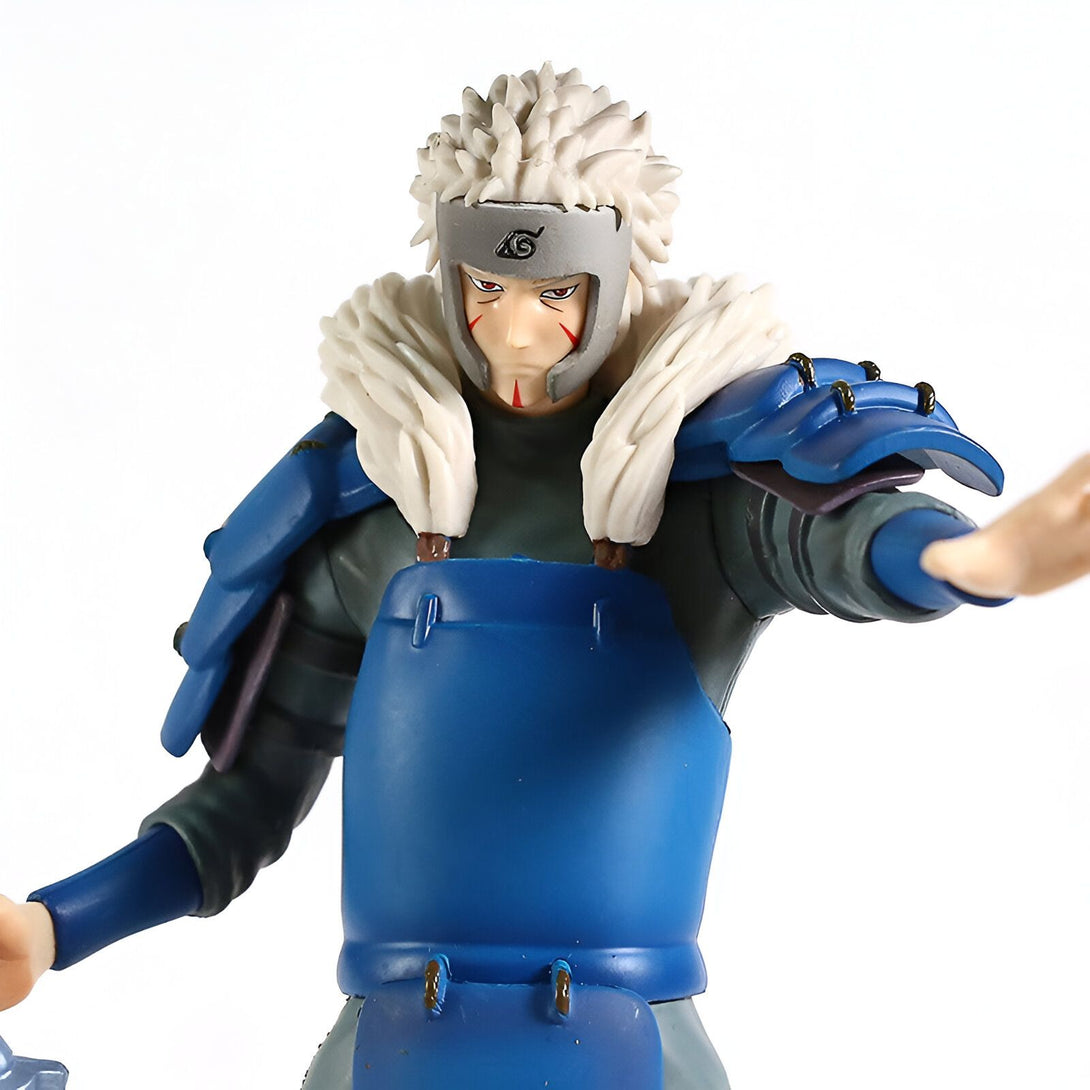 Figur de collection de Naruto représentant Kakashi Hatake, portant son armure bleue et son bandeau frontal de Konoha, dans une pose dynamique.