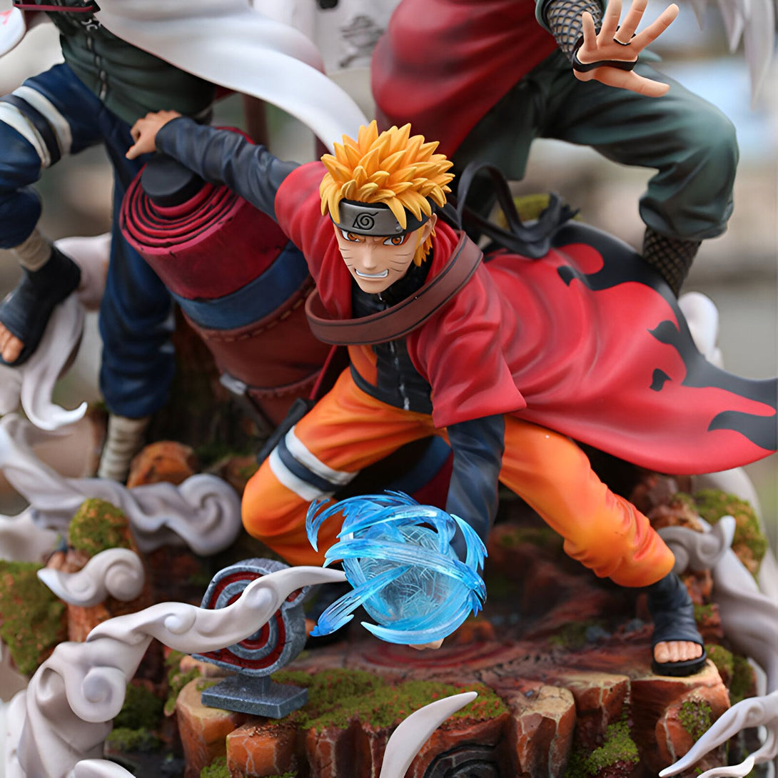 Naruto Uzumaki en figurine, tenant une sphère d'énergie bleue, dans sa tenue de l'arc Pain de la série animée Naruto Shippuden. La figurine est posée sur un socle rocheux, avec des effets de fumée et de poussière.
