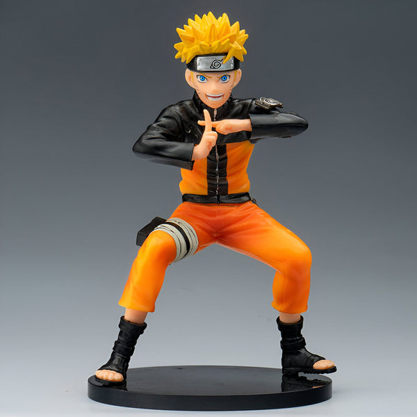 Naruto Uzumaki, le célèbre personnage de l'anime Naruto, est représenté dans une pose dynamique. Il porte sa tenue signature orange et noire. La figurine est faite de PVC et est de haute qualité.  Découvrez la figurine de Naruto Uzumaki et d'autres produits Naruto sur notre boutique en ligne.