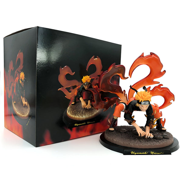 Figurine Naruto Uzumaki en mode neuf queues avec une base noire et un emballage noir et orange.