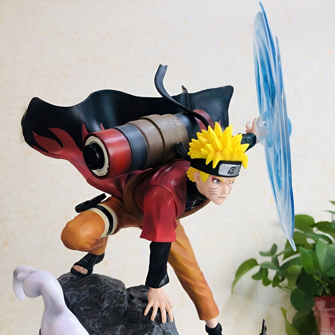 Naruto Uzumaki, le célèbre ninja de Konoha, en pleine action, prêt à lancer une attaque. Sa posture dynamique, sa cape rouge flamboyante et son regard déterminé témoignent de sa puissance et de sa détermination. Cette figurine est un must-have pour tous les fans de Naruto.