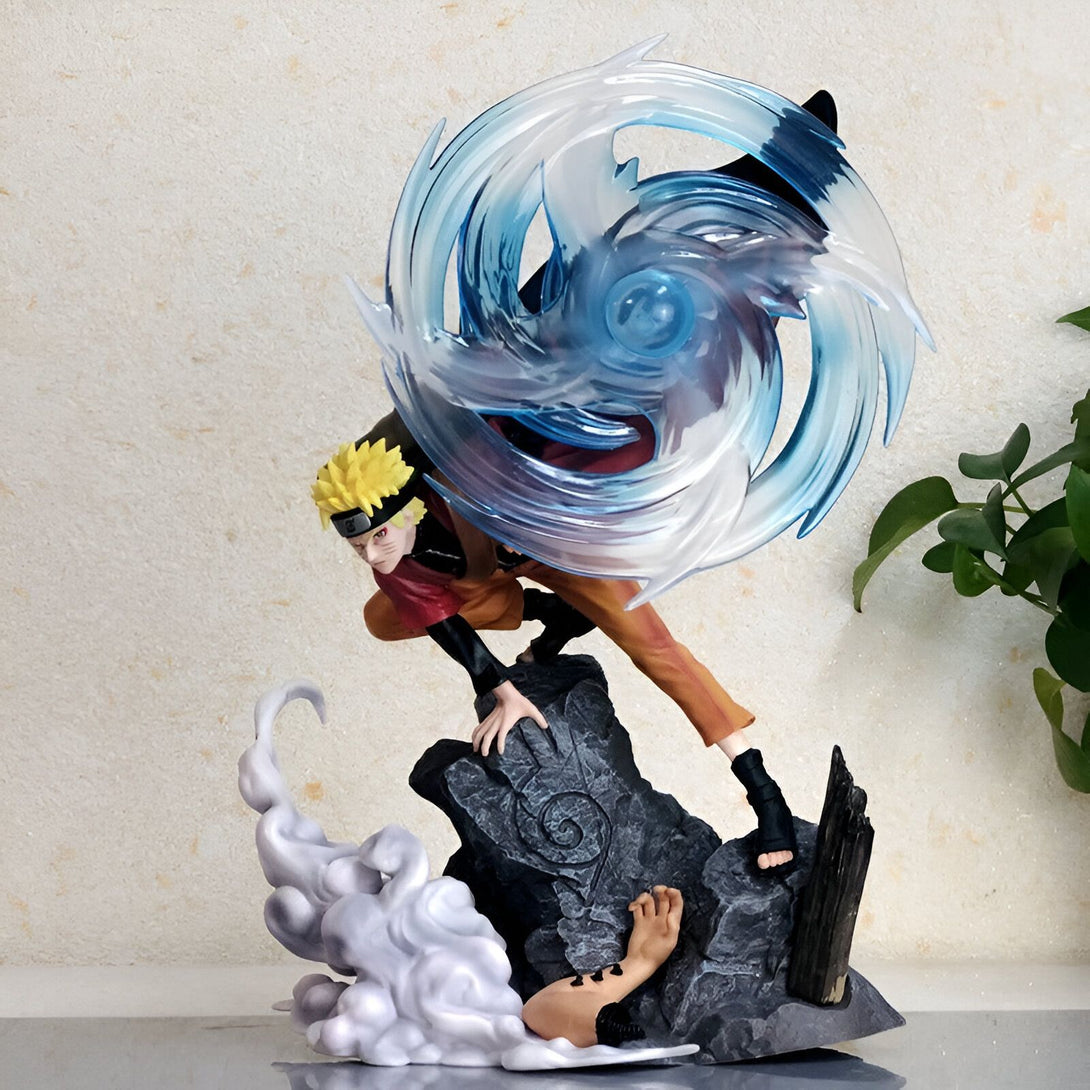 Statue de Naruto Uzumaki en action, utilisant le Rasengan, avec un effet de fumée et de chakra bleu.  Figure de collection Naruto Shippuden.