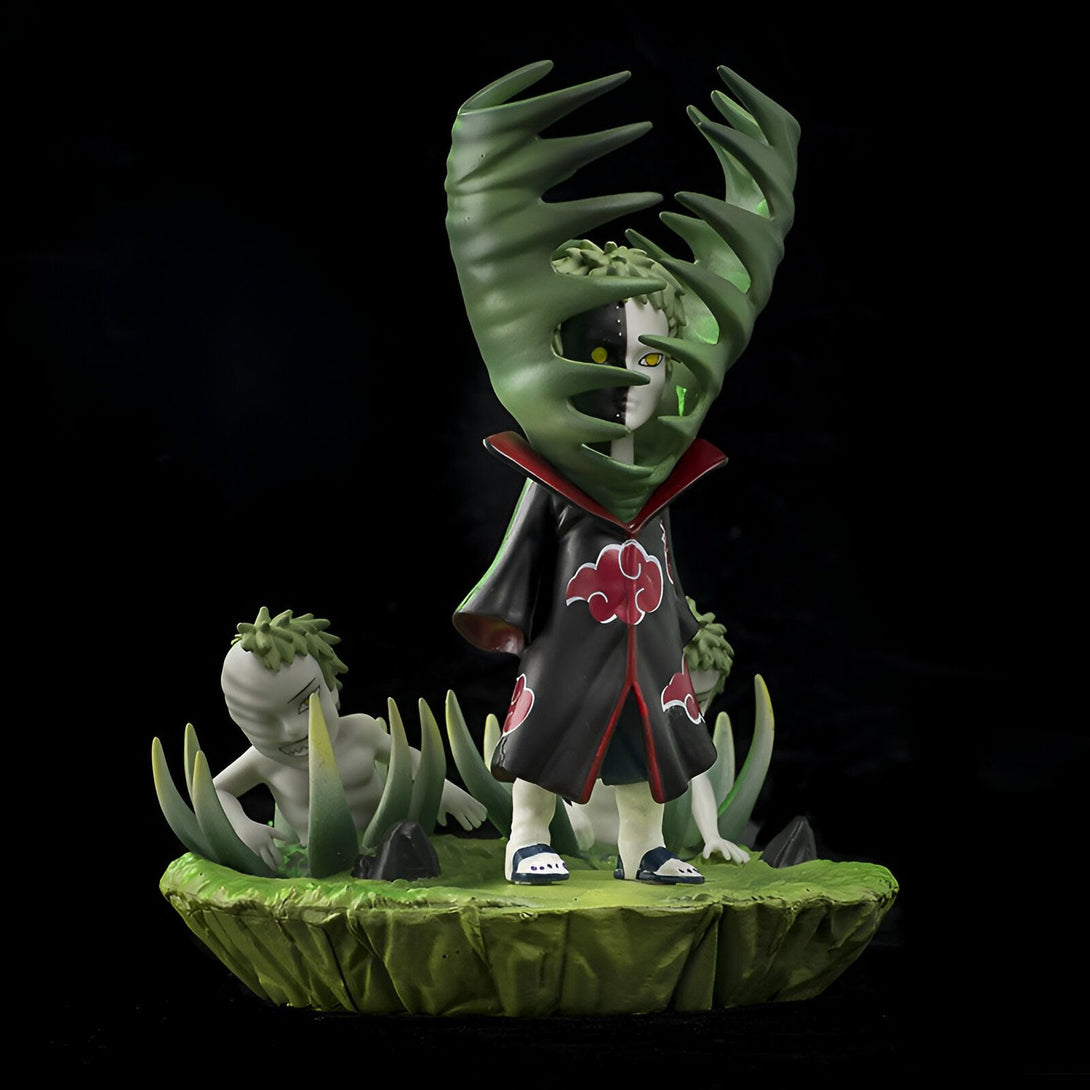 Figurines chibi de Naruto représentant Pain, le chef d'Akatsuki, et ses Six Chemins de la Peine, sur un socle vert.
