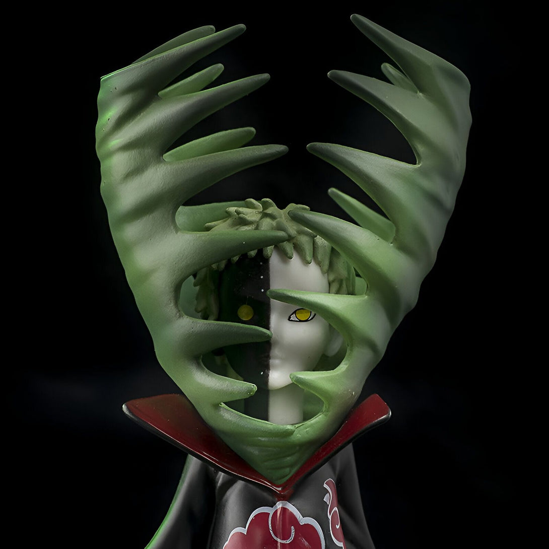 Figurines Naruto Shippuden, figurine de Pain en mode Shinra Tensei. Pain est enveloppé de sa technique de Shinra Tensei avec des épines vertes pointues. Il porte son manteau rouge avec le symbole de l'Akatsuki.