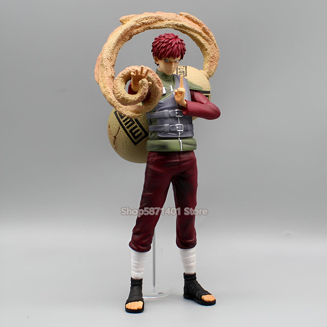 Figure de Gaara de Naruto Shippuden avec un sac de sable et du sable qui tourbillonne autour de lui.