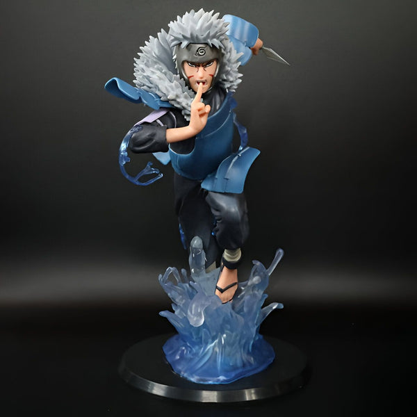 Figur  de Zabuza Momochi, personnage de l'anime Naruto, en action avec son épée et des effets d'eau.  Il porte une tenue bleue et noire avec des détails de fourrure blanche.