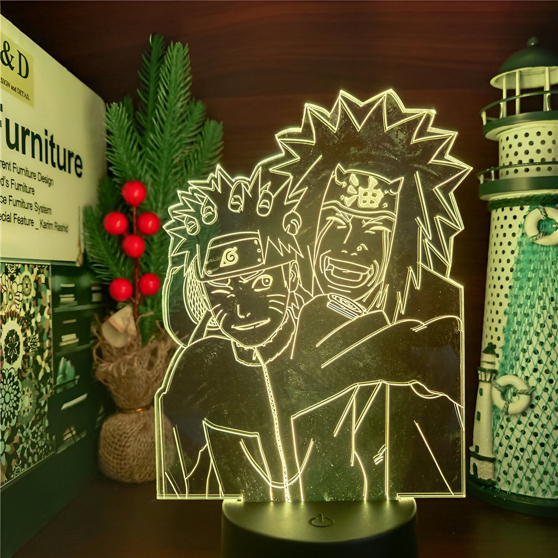 Lampe de nuit 3D représentant Naruto et Jiraiya, personnages de l'anime Naruto. La lampe est allumée et projette une lumière jaune sur les personnages.