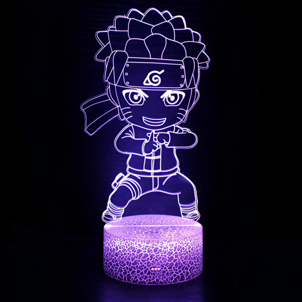 Lampe de chevet LED représentant Naruto dans une pose de combat, illuminée en violet. La lampe est idéale pour les fans de Naruto et apportera une touche d'anime à votre chambre.