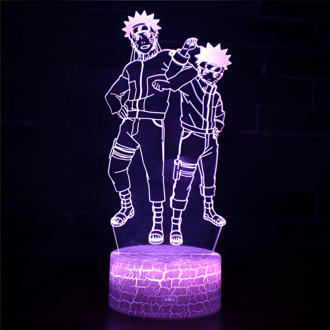 Lampe de nuit LED avec design Naruto représentant Naruto et Sasuke en pose dynamique. La lampe est sur une base en acrylique avec un effet craquelé. Parfaite pour les fans de Naruto !