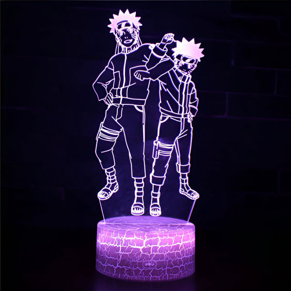 Lampe de nuit LED avec design Naruto représentant Naruto et Sasuke en pose dynamique. La lampe est sur une base en acrylique avec un effet craquelé. Parfaite pour les fans de Naruto !