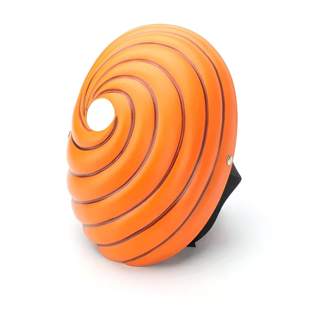 Masque de Pain, personnage de l'anime Naruto, avec un motif de cercles concentriques orange. Le masque est en plastique et est doté d'une sangle noire.