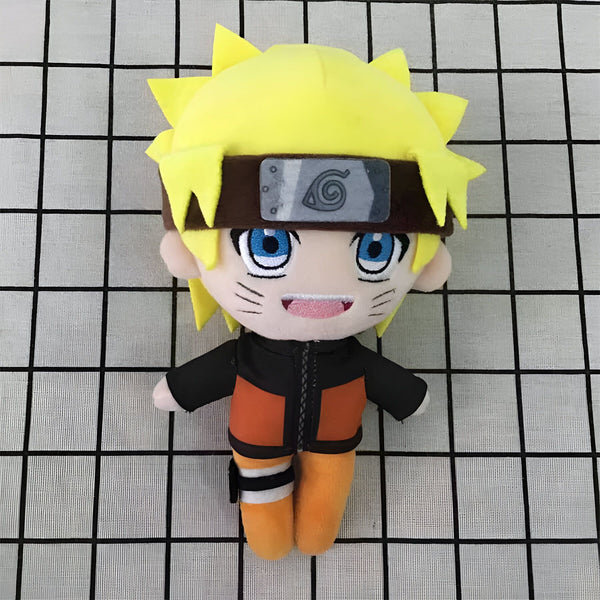 Peluche Naruto Uzumaki, un personnage populaire de l'anime Naruto, avec ses cheveux blonds, son bandeau frontal et sa tenue orange. Cette peluche est parfaite pour les fans de l'anime.