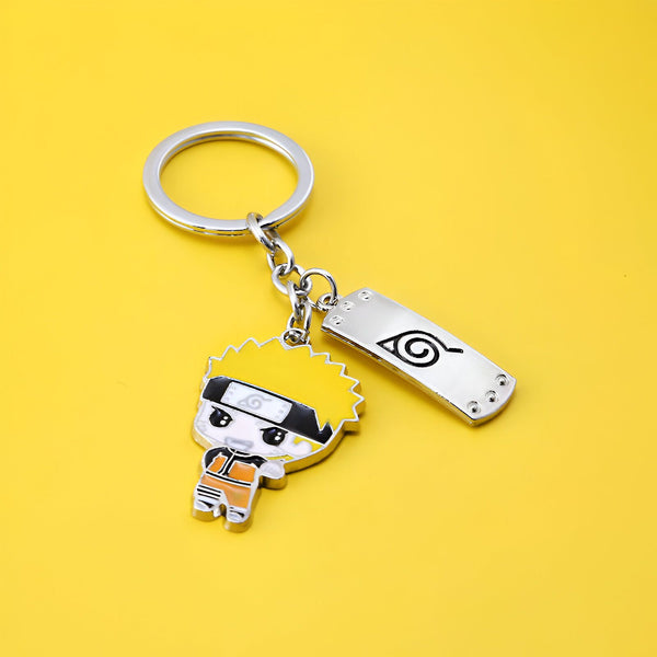 Porte-clés Naruto avec une figurine de Naruto Uzumaki et le symbole du village de Konoha.